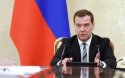 Медведев обещает ответ "без ограничений" на санкции по SWIFT